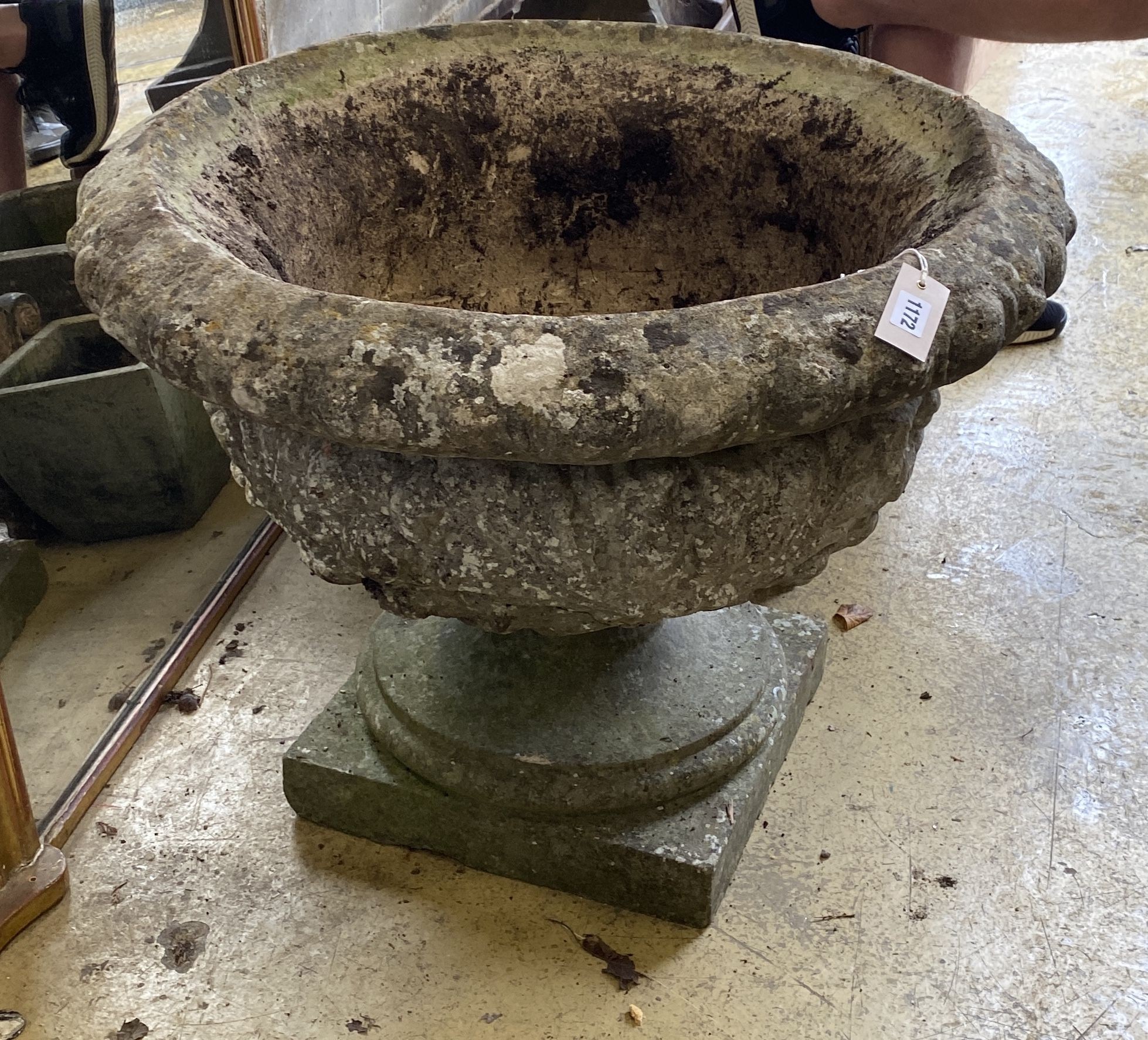 A large circular reconstituted stone campana garden urn on base, diameter 76cm, height 60cm